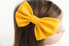 Load image into Gallery viewer, Weather Warriors Yellow Bamboo Alligator Clip Bows
